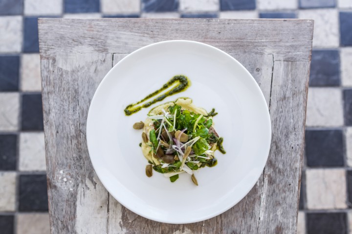 Charred seasonal greens with anchovy vinaigrette