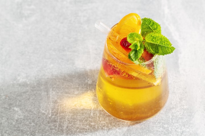 Daylight sangria blanca with stone fruit